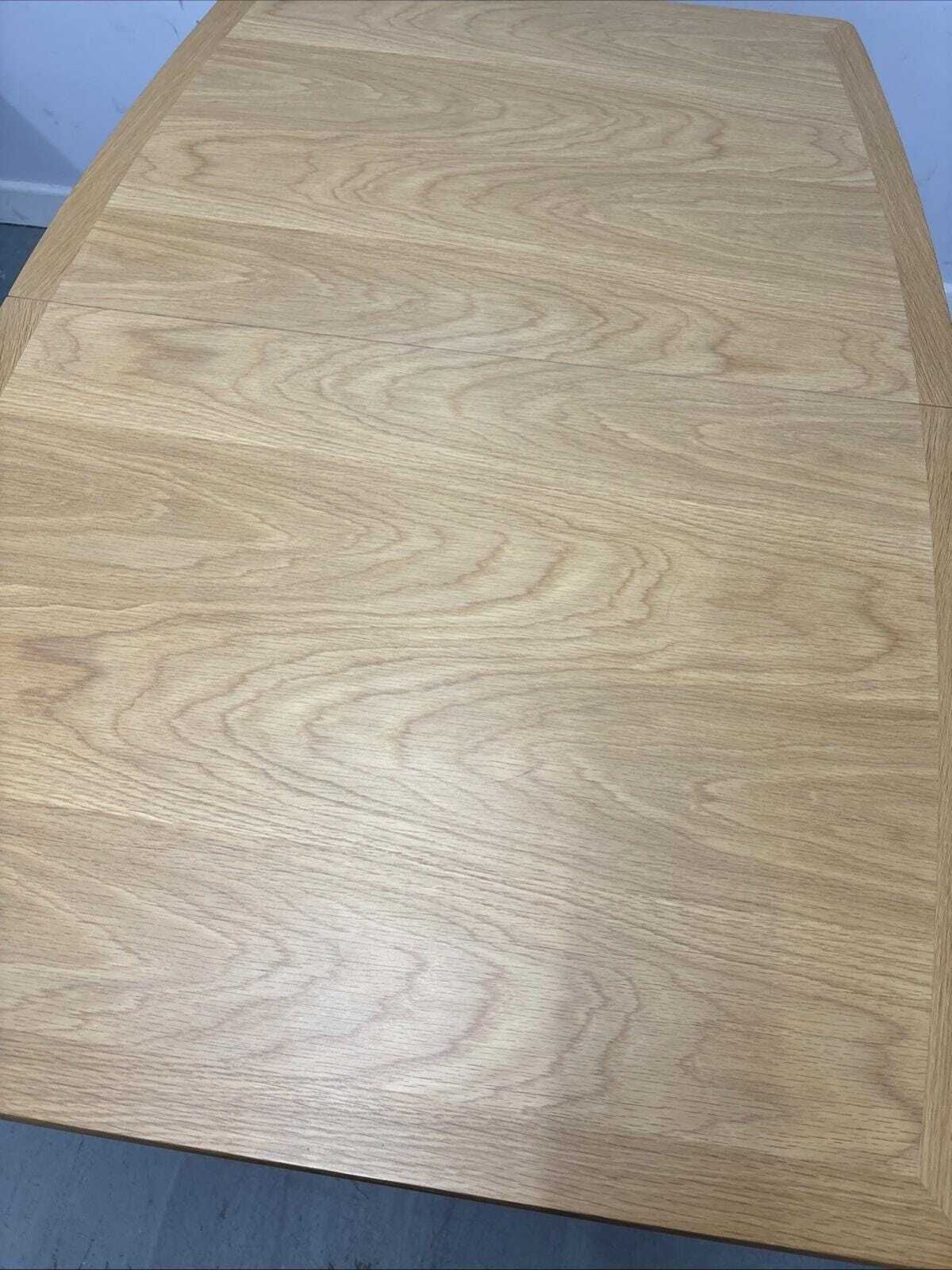 Nathan Shades Boat Shaped Extending Dining Table – Oak Finish photo buy
