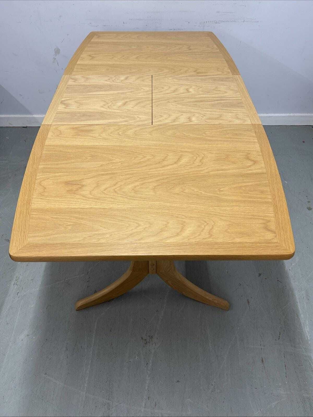 photo for sale Nathan Shades Boat Shaped Extending Dining Table – Oak Finish