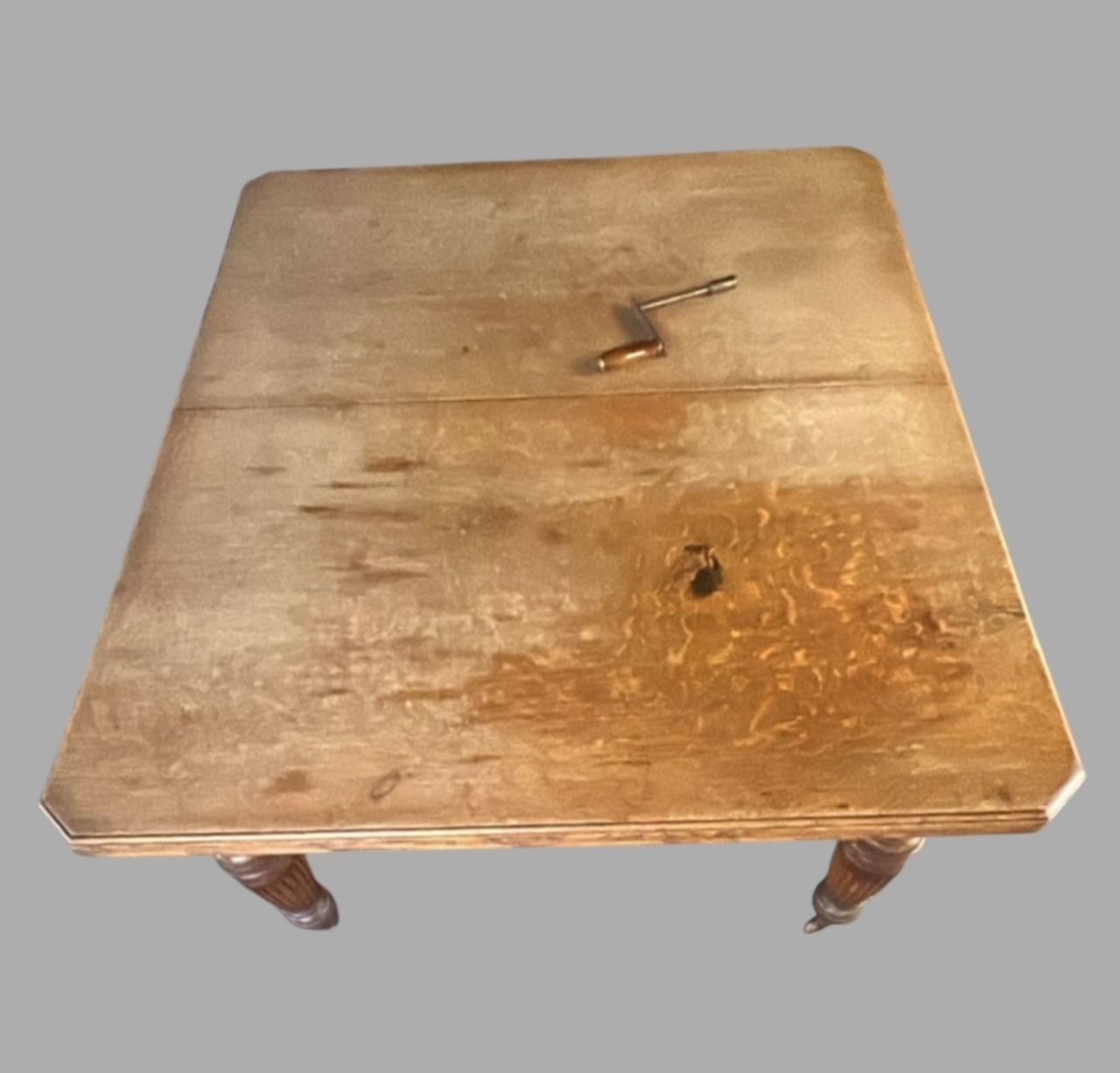 A Characterful Antique Oak Dining Table With Extending Leaves photo for sale