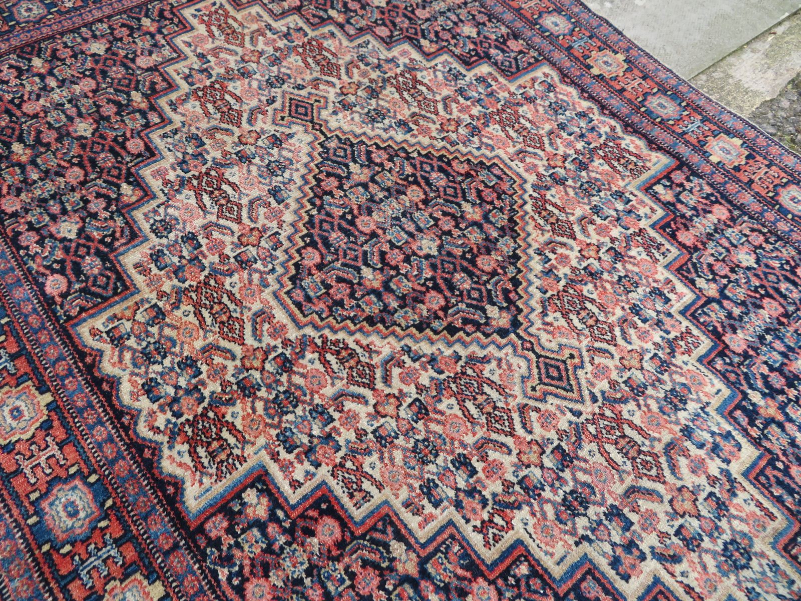 photo furniture Kurdish Senneh Rug. 135cm X 102cm.
