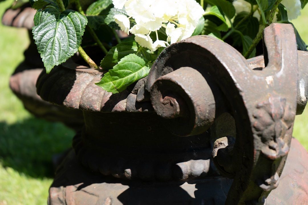 photo furniture A Pair Of Antique Cast Iron French Garden Urns