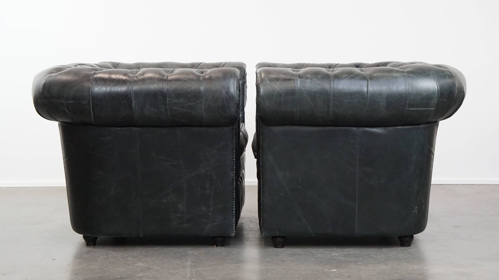 Timeless And Classic Set Of Spacious Black Chesterfield Armchairs Made Of Characterful Grained Cowhide photo furniture