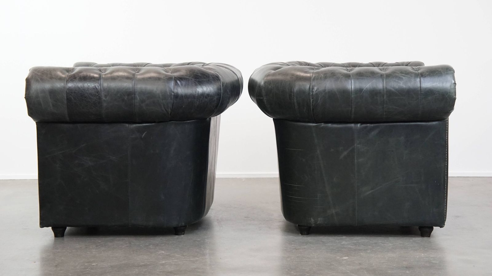 Timeless And Classic Set Of Spacious Black Chesterfield Armchairs Made Of Characterful Grained Cowhide photo Furniture