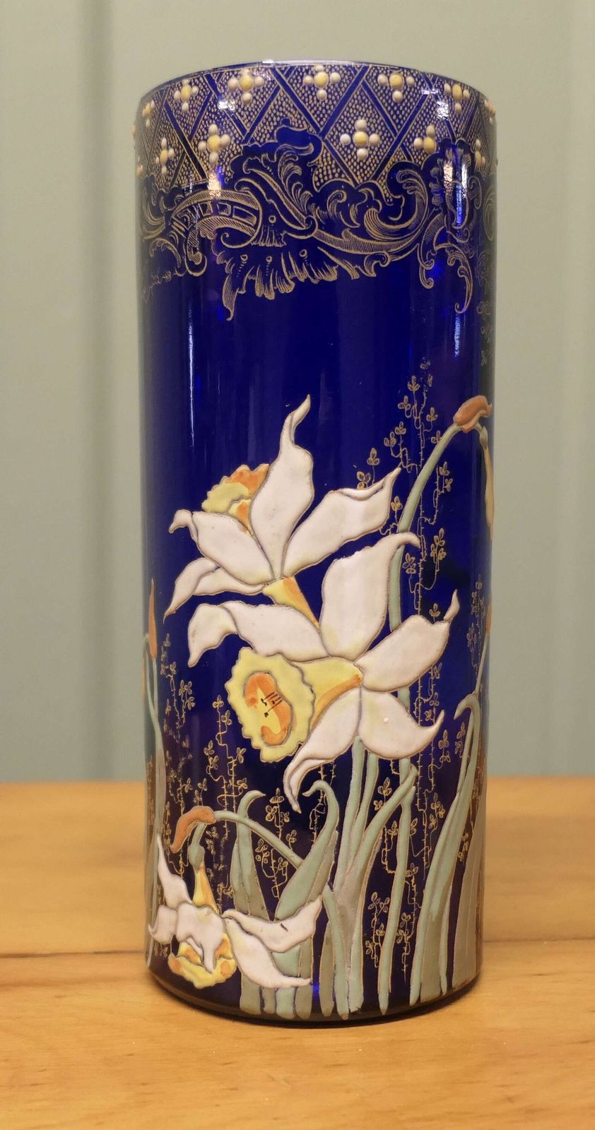 A Stunning Cobalt Blue Enamelled Vase With Daffodils photo furniture
