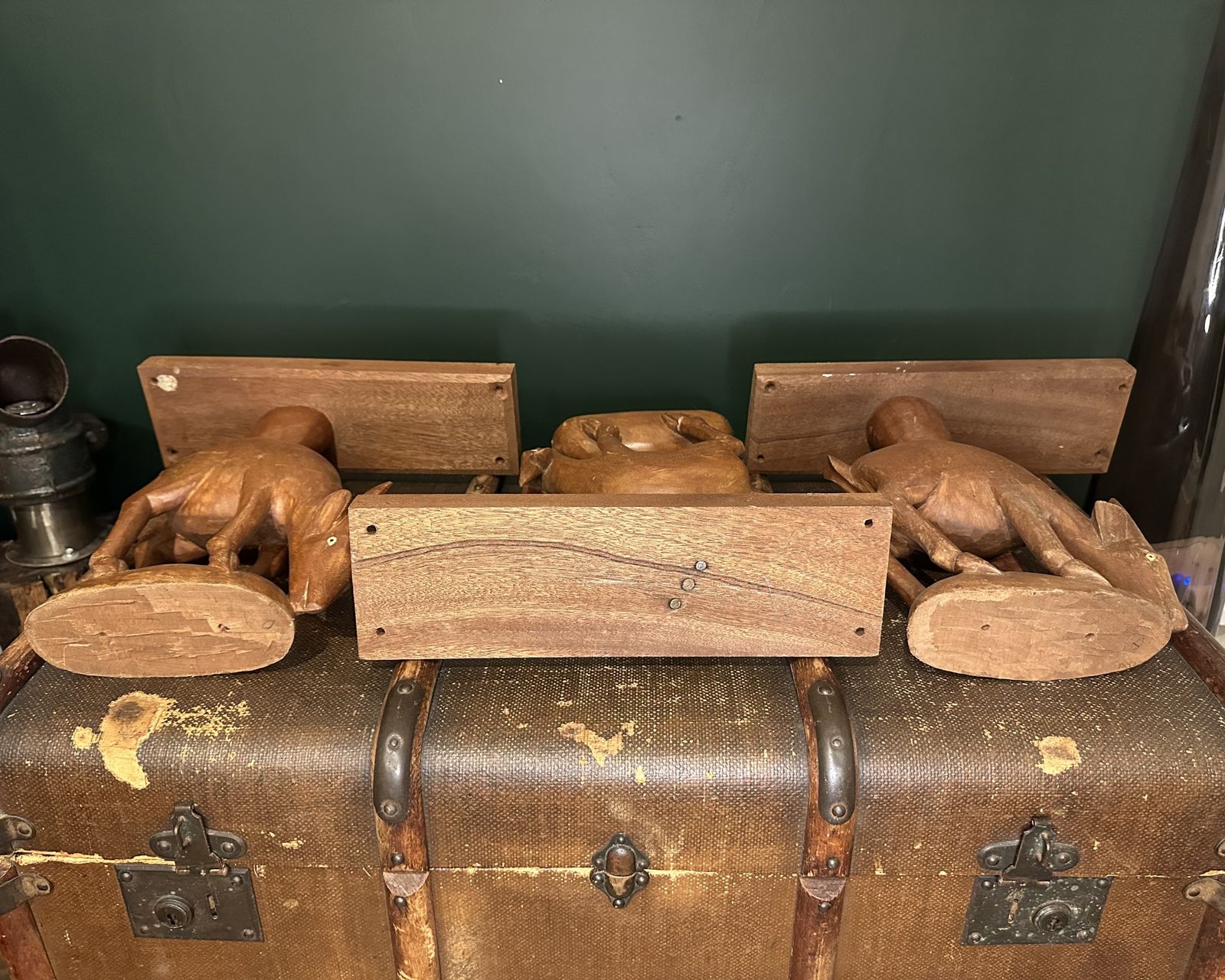 An Odd Collection Of Hand Carved Antelope Sculptures photo buy