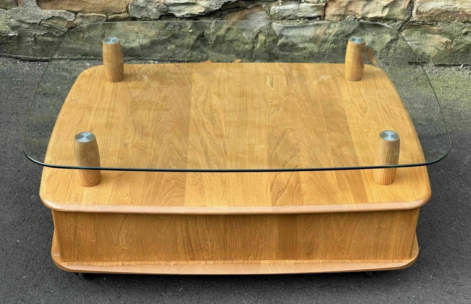 585.0 Ercol Light Elm Windsor Glass Top Coffee Table   Pandoras Box photo