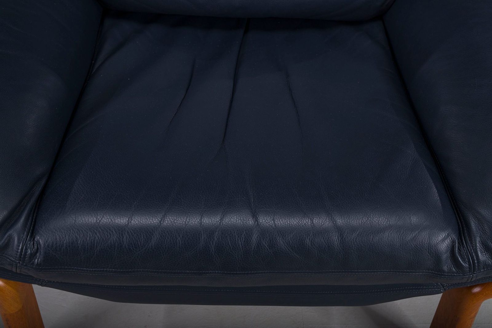 Danish Teak And Navy Blue Leather Lounge Chair From Komfort, 1970s photo vinterior