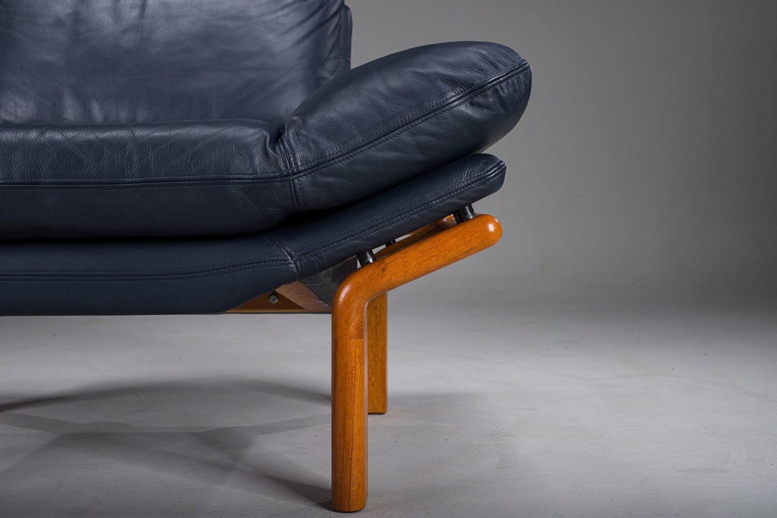 Danish Teak And Navy Blue Leather Lounge Chair From Komfort, 1970s photo vintage