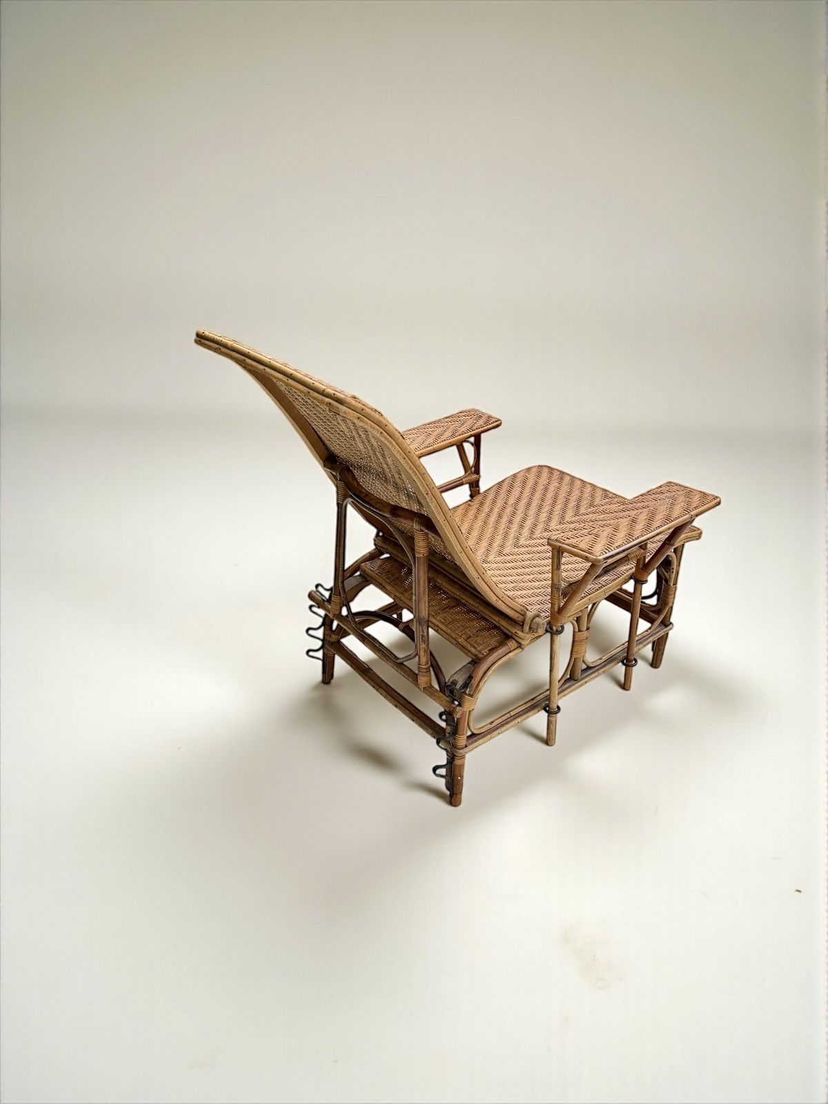 A French Early C 20th Steamer Lounge Chair In Bamboo And Cane