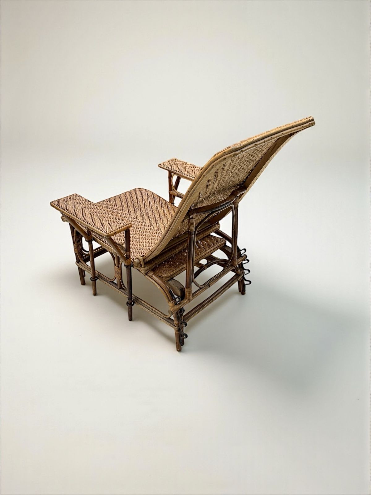 A French Early C 20th Steamer Lounge Chair In Bamboo And Cane photo vinterior