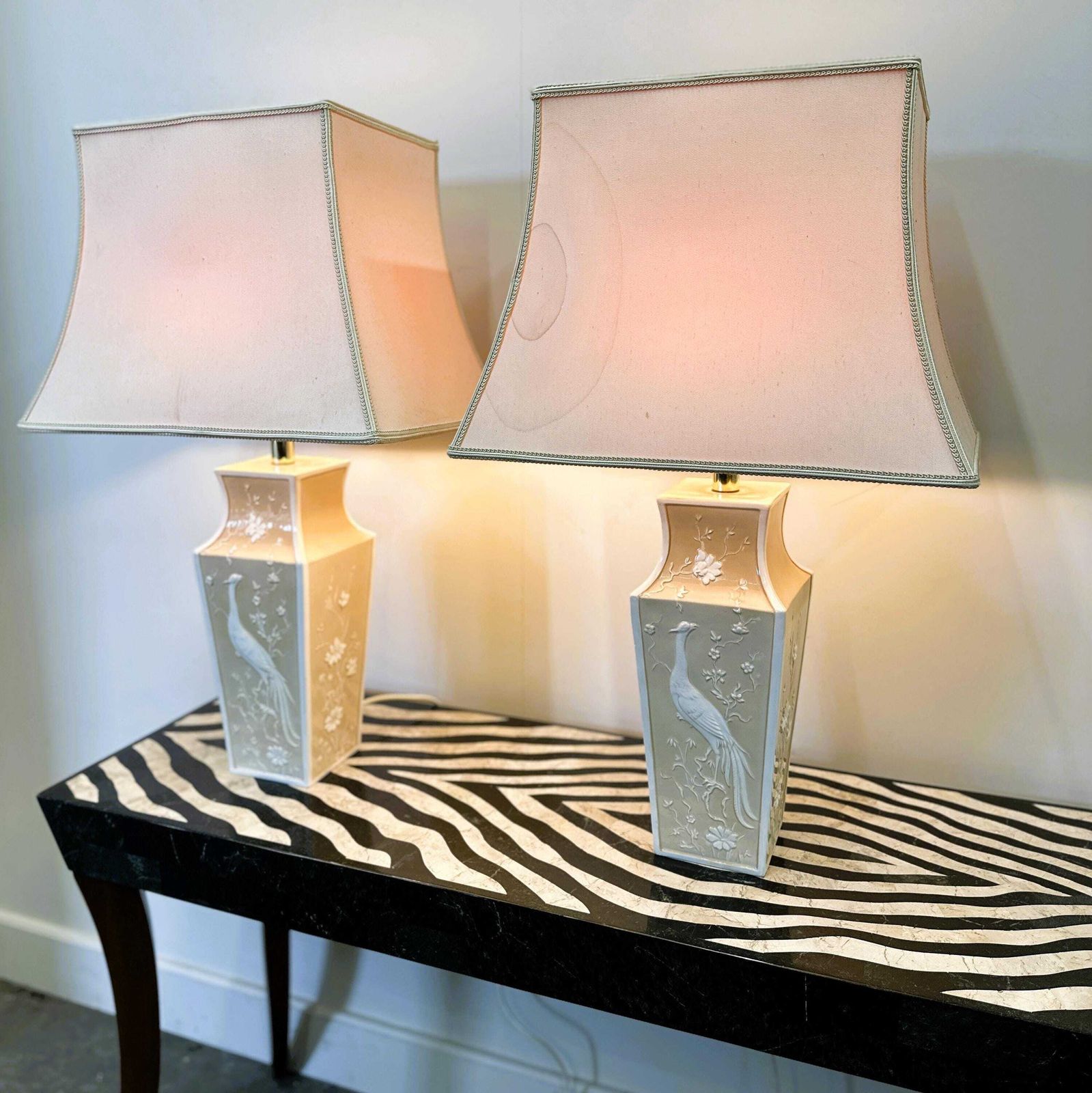 Pair Of Large Cream Ceramic Table Lamps With Relief Peacocks And Fabric Shades, 1980s photo vinterior