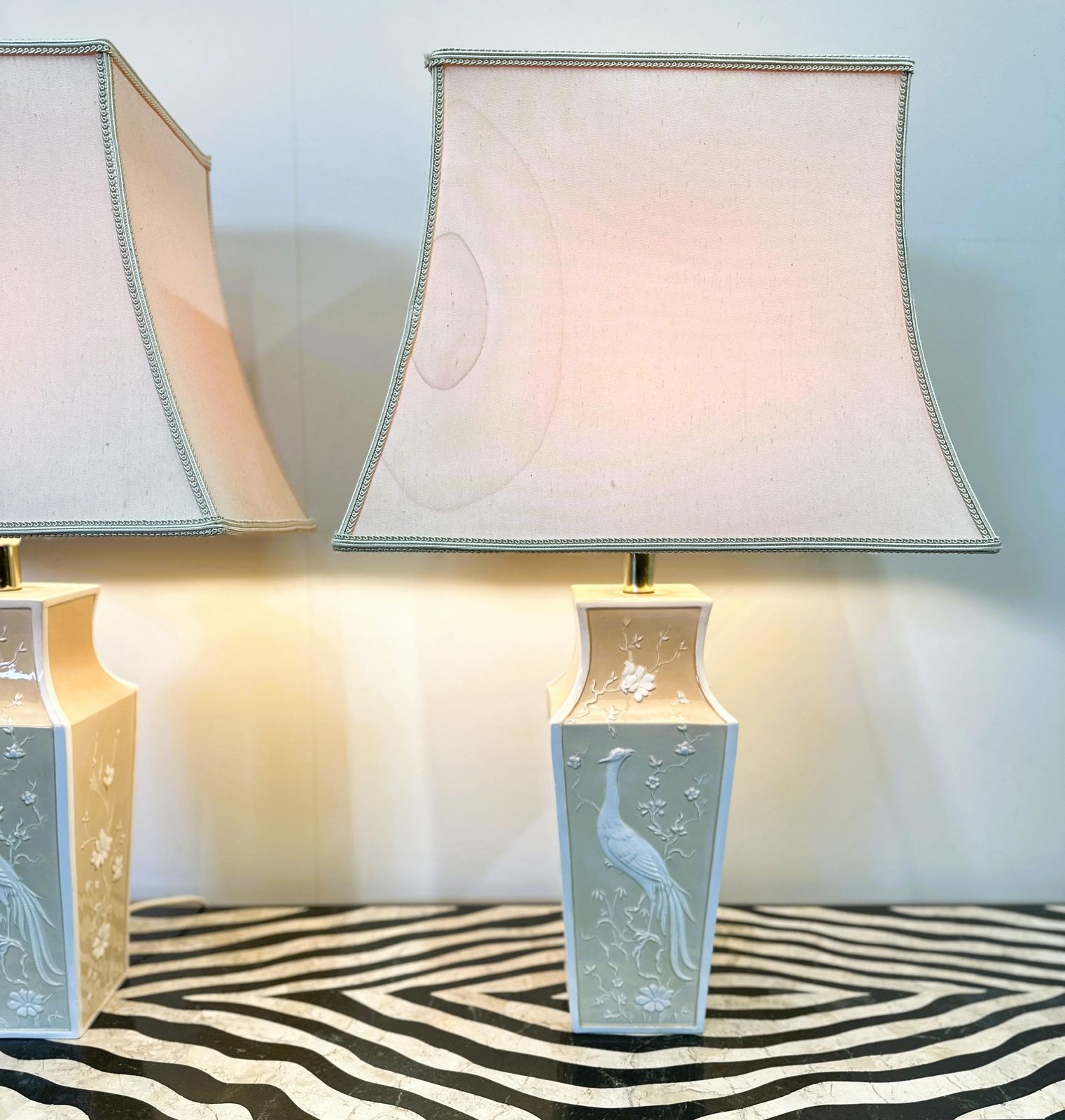 Lighting Pair Of Large Cream Ceramic Table Lamps With Relief Peacocks And Fabric Shades, 1980s photo