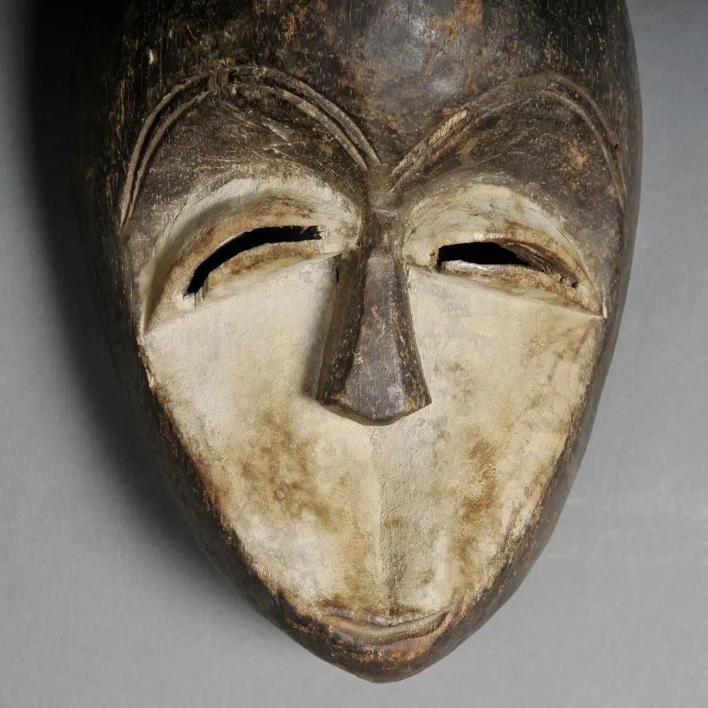 Traditional Kéwélé Mask In Patinated Wood – Brown & Ivory Congo Tribal Art photo for sale