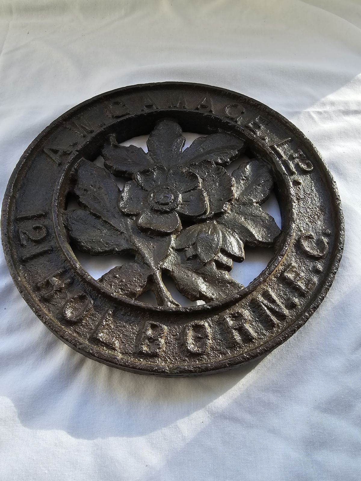 'A. W. Gamage Ltd. 121 Holborn E.C.' Large Cast Iron Roundel Plaque. Double Sided Ideal Paperweight
