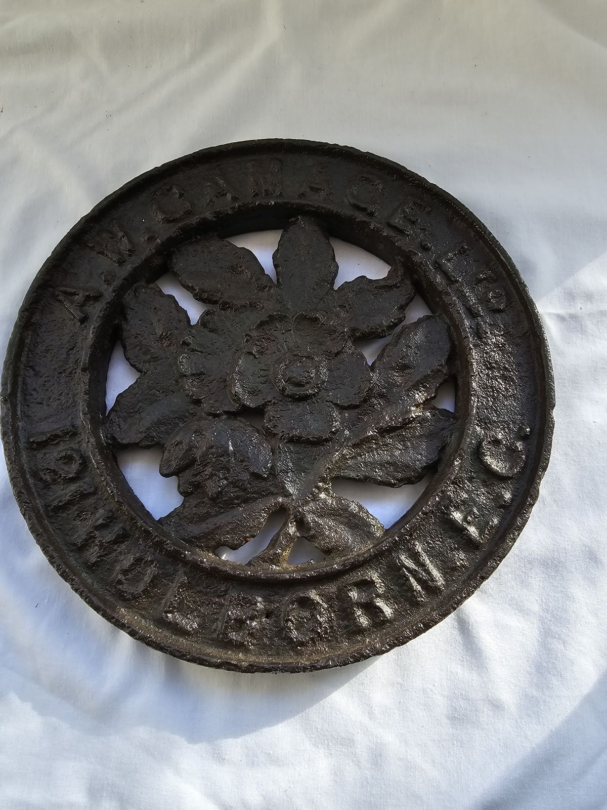 'A. W. Gamage Ltd. 121 Holborn E.C.' Large Cast Iron Roundel Plaque. Double Sided Ideal Paperweight photo for sale