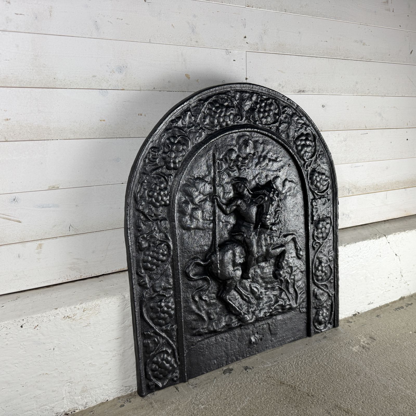 Antique Cast Iron Fire Back Depicting A Soldier On Horseback photo furniture