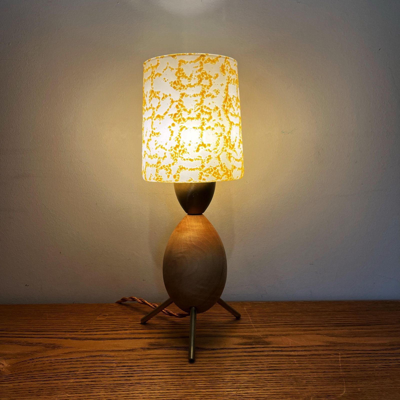 Vintage Atomic Wooden Tripod Lamp With White & Gold Glass Shade. photo furniture