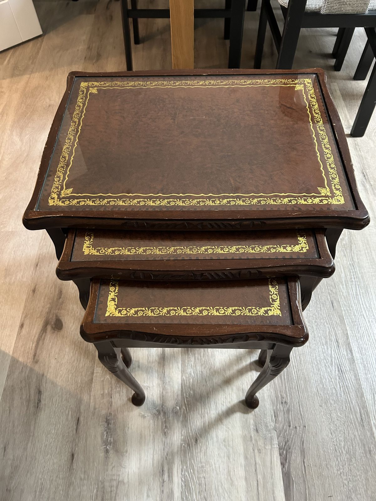Nest Of 3 Tables With Leather Insert Topped Off With Glass Panel. Decorative Legs On All 3 photo furniture