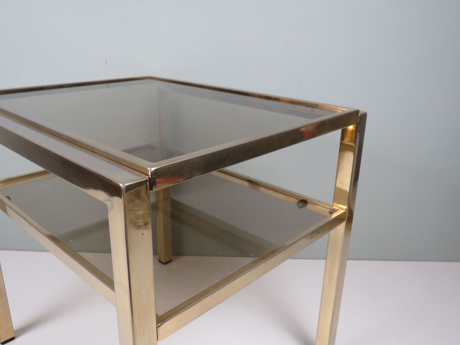 Hollywood Regency Brass And Smoked Glass Side Table By De Knudt, Belgium, 1970s photo for sale