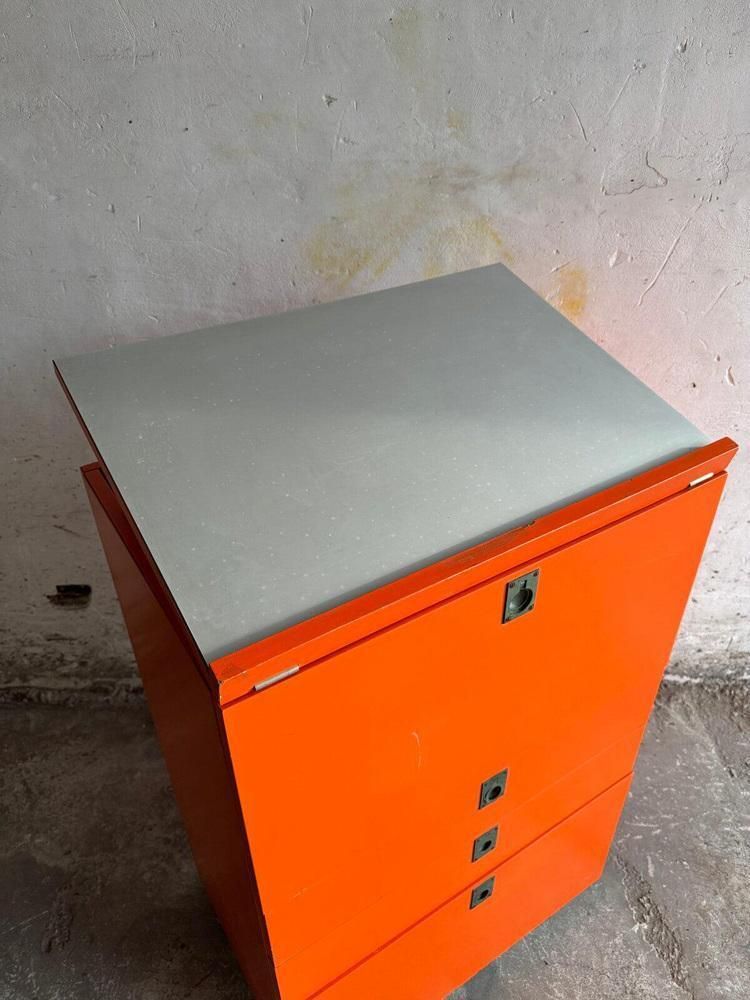 Orange Chest Of Drawers With Fold Out Work Surface And Slanted Top photo furniture