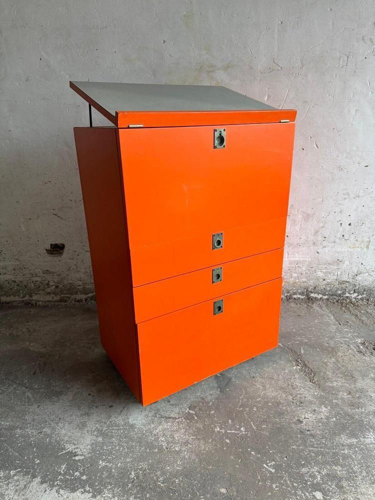 photo furniture Orange Chest Of Drawers With Fold Out Work Surface And Slanted Top