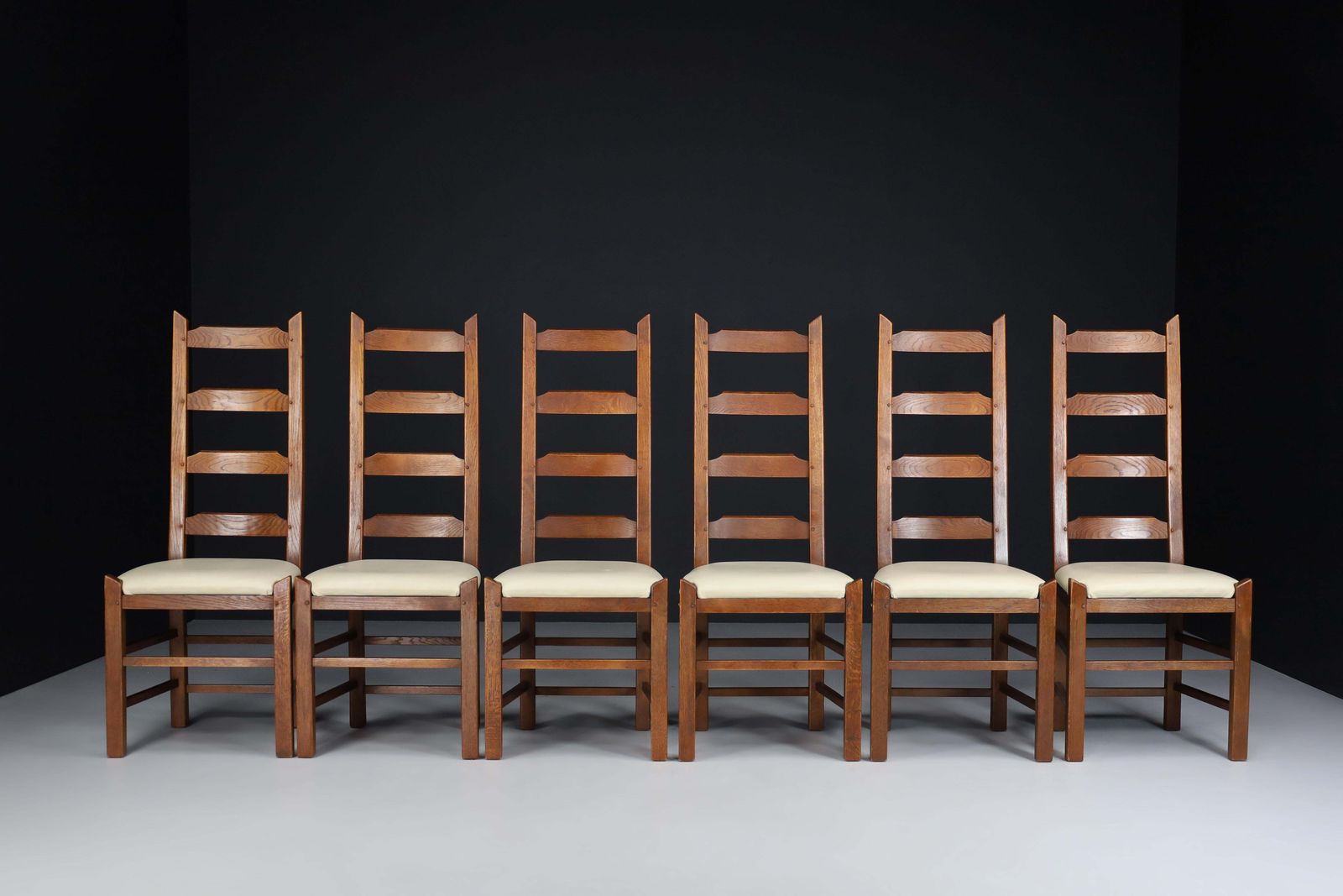 photo furniture Ladder Back Chairs Crafted In Oak And Leather Seats, France, 1950s