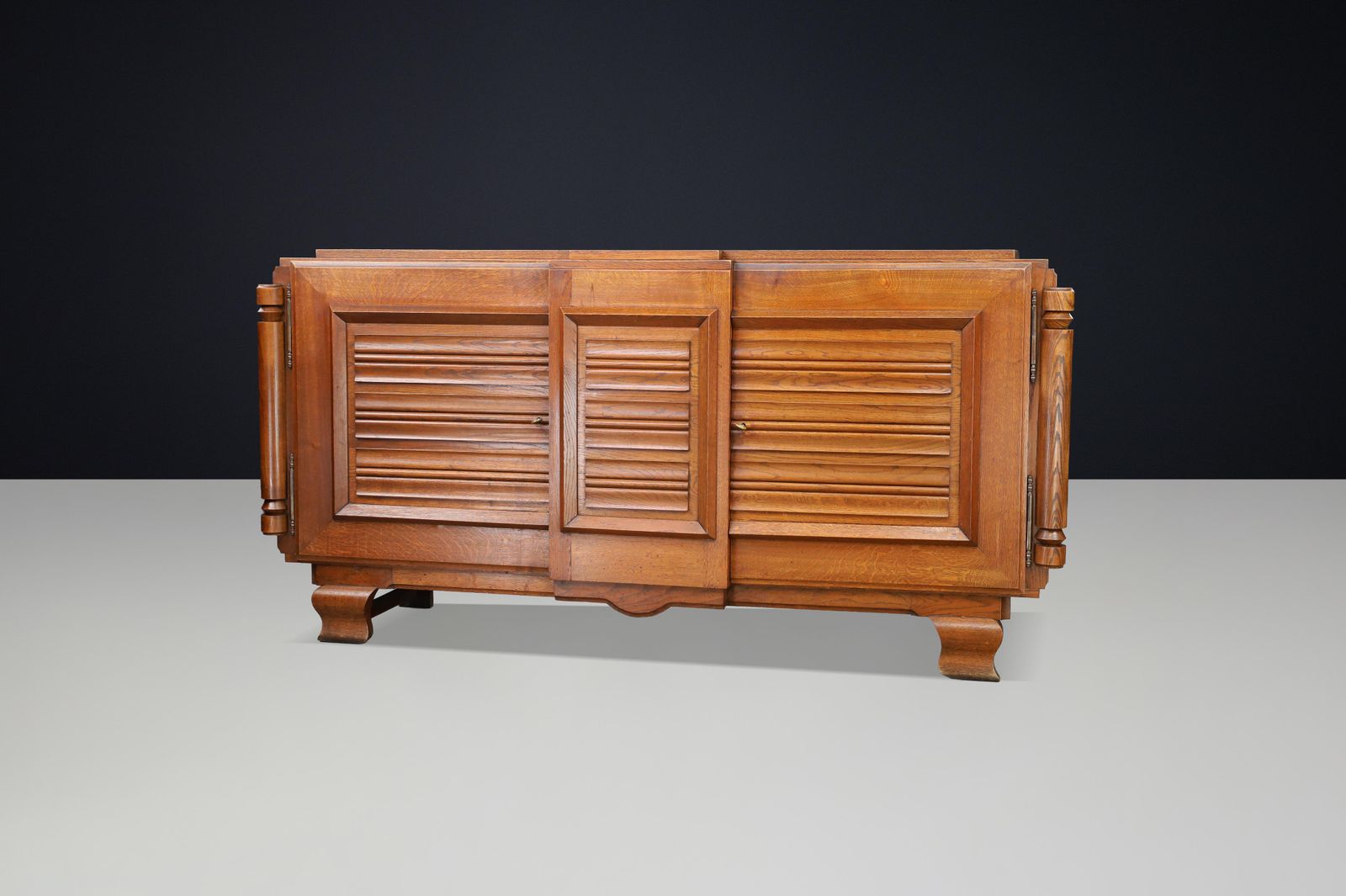 photo furniture French Art Deco Patinated Oak Sideboard With Relief Carved Doors, 1940s