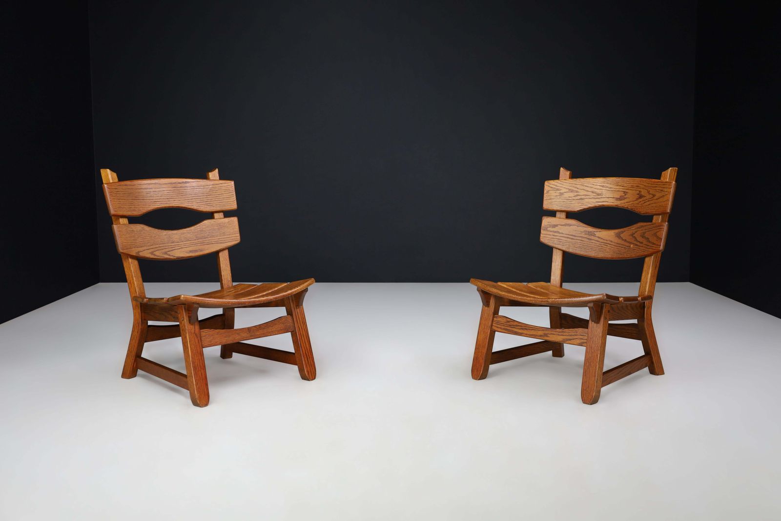 Pair Of Sculptural Brutalist Oak Lounge Chairs, France, 1960s photo for sale