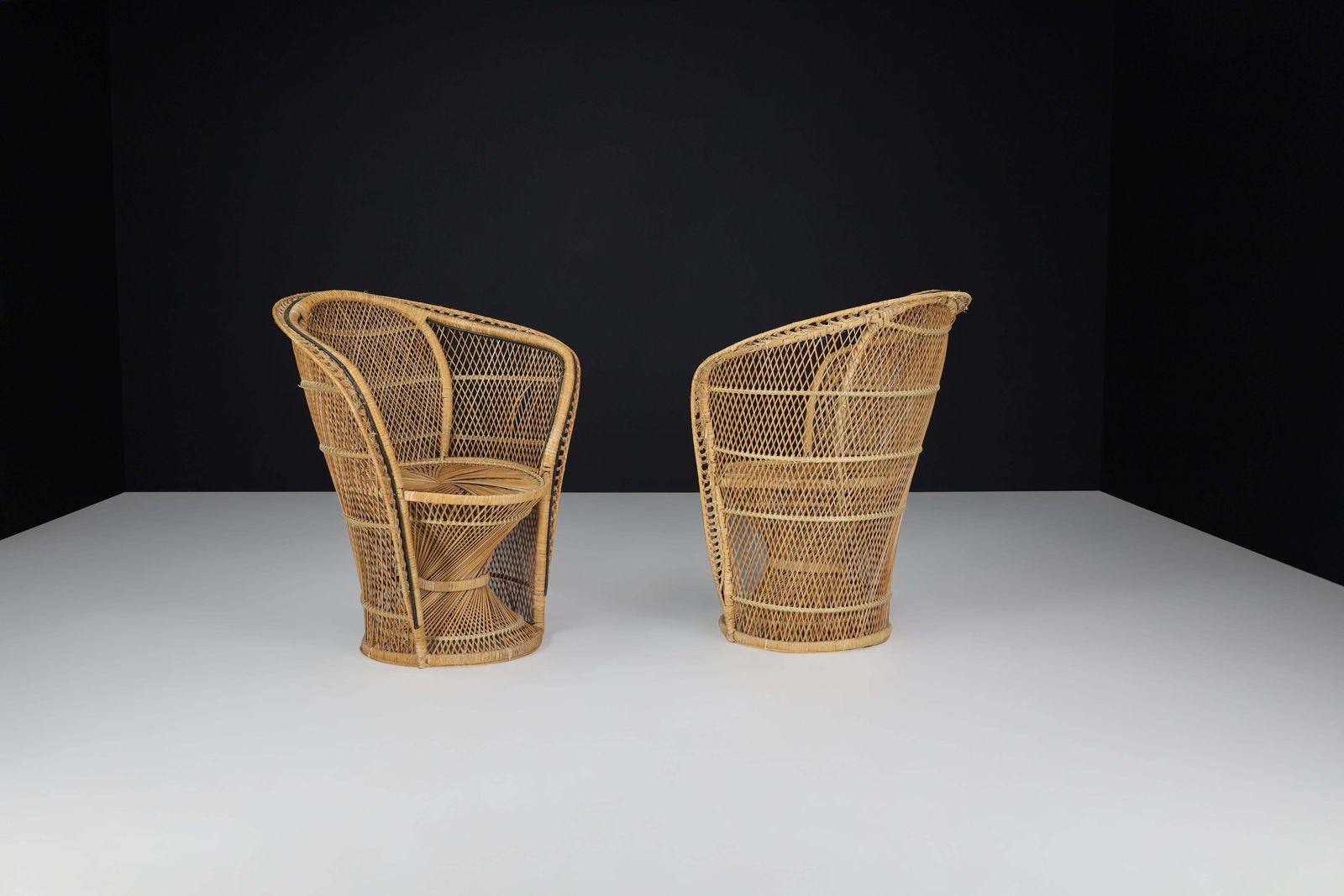photo furniture Pair Of Bohemian Wicker Emmanuelle Peacock Chairs, France, 1950s