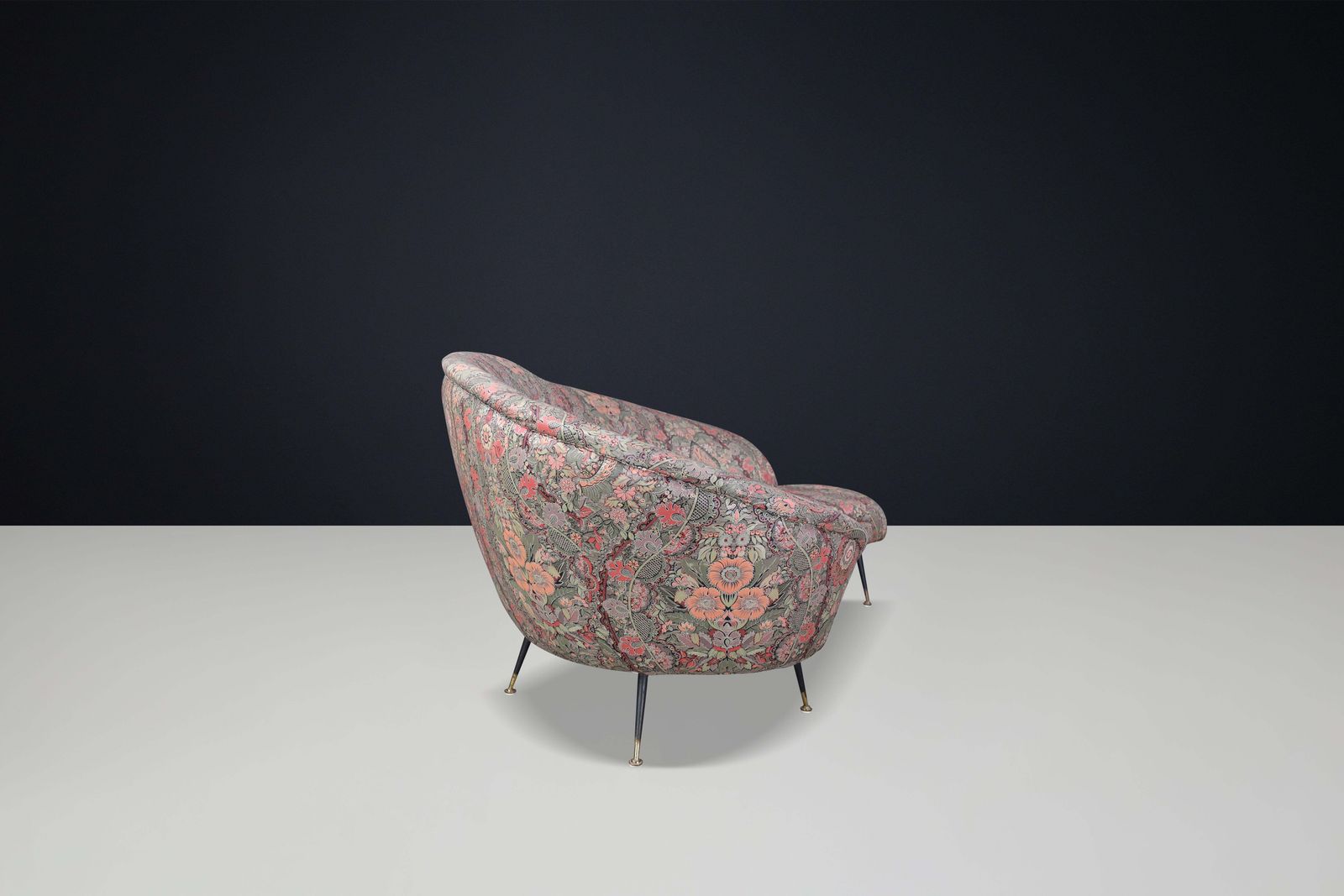 photo furniture Federico Munari Curved Sofa In Original Floral Upholstery With Brass Feet, Italy