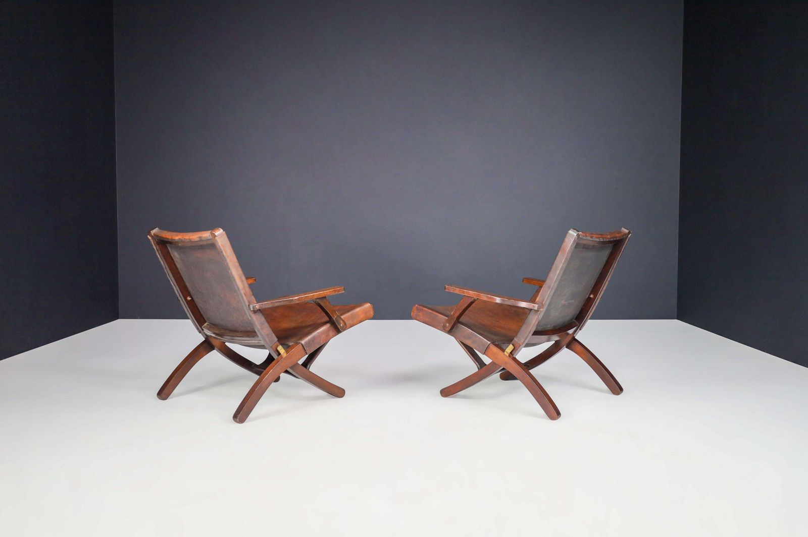 Angel I. Pazmino Cognac Colored Saddle Leather Arm Chairs Ecuador 1970s photo vinterior