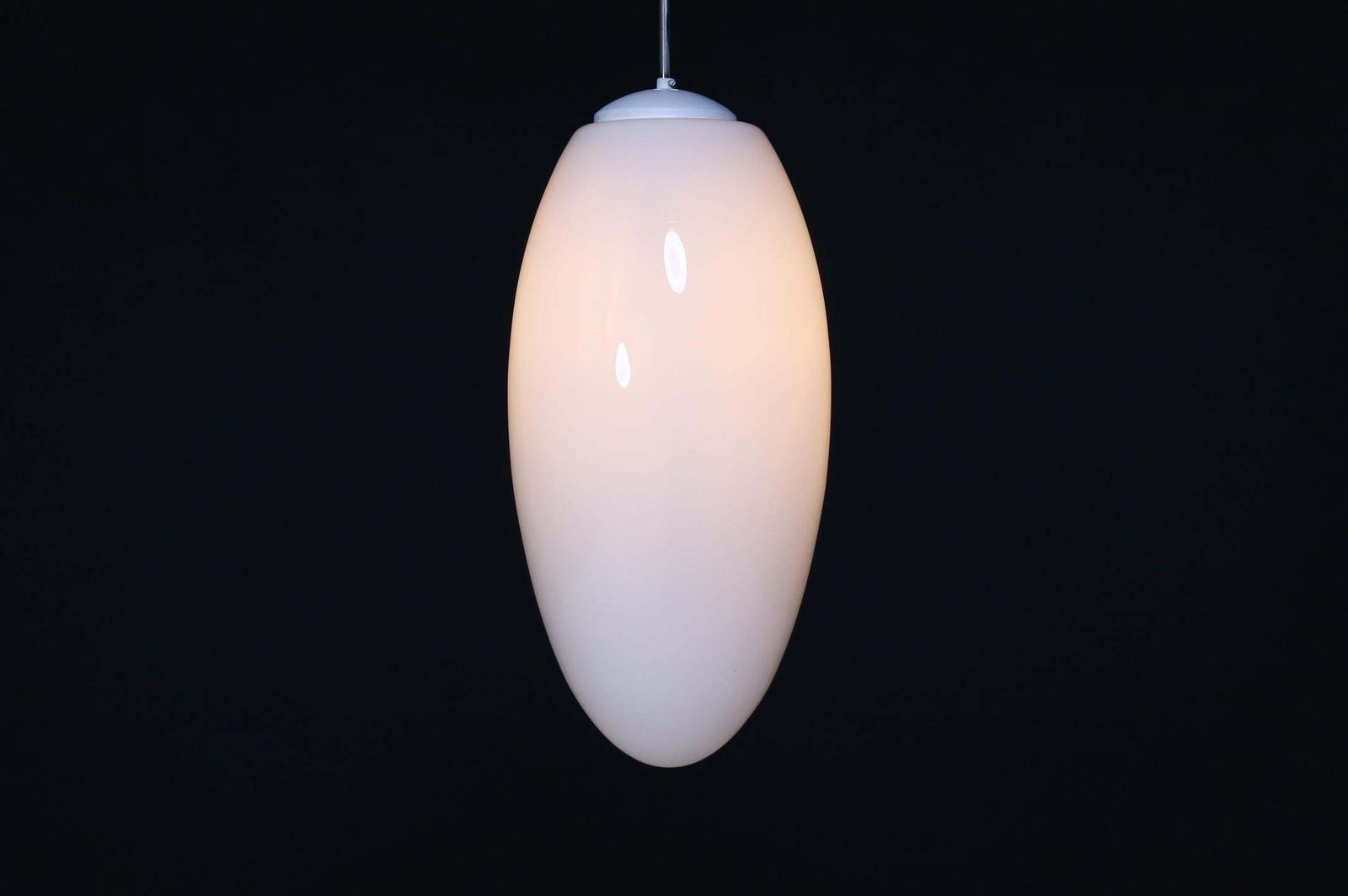 photo furniture Large Set Pendants Ellipse Opaline Glass, Europe The 1960s.