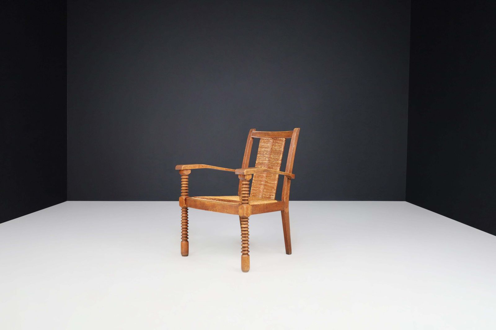 Charles Dudouyt Patinated Oak And Rush Armchairs, France 1940s photo vinterior