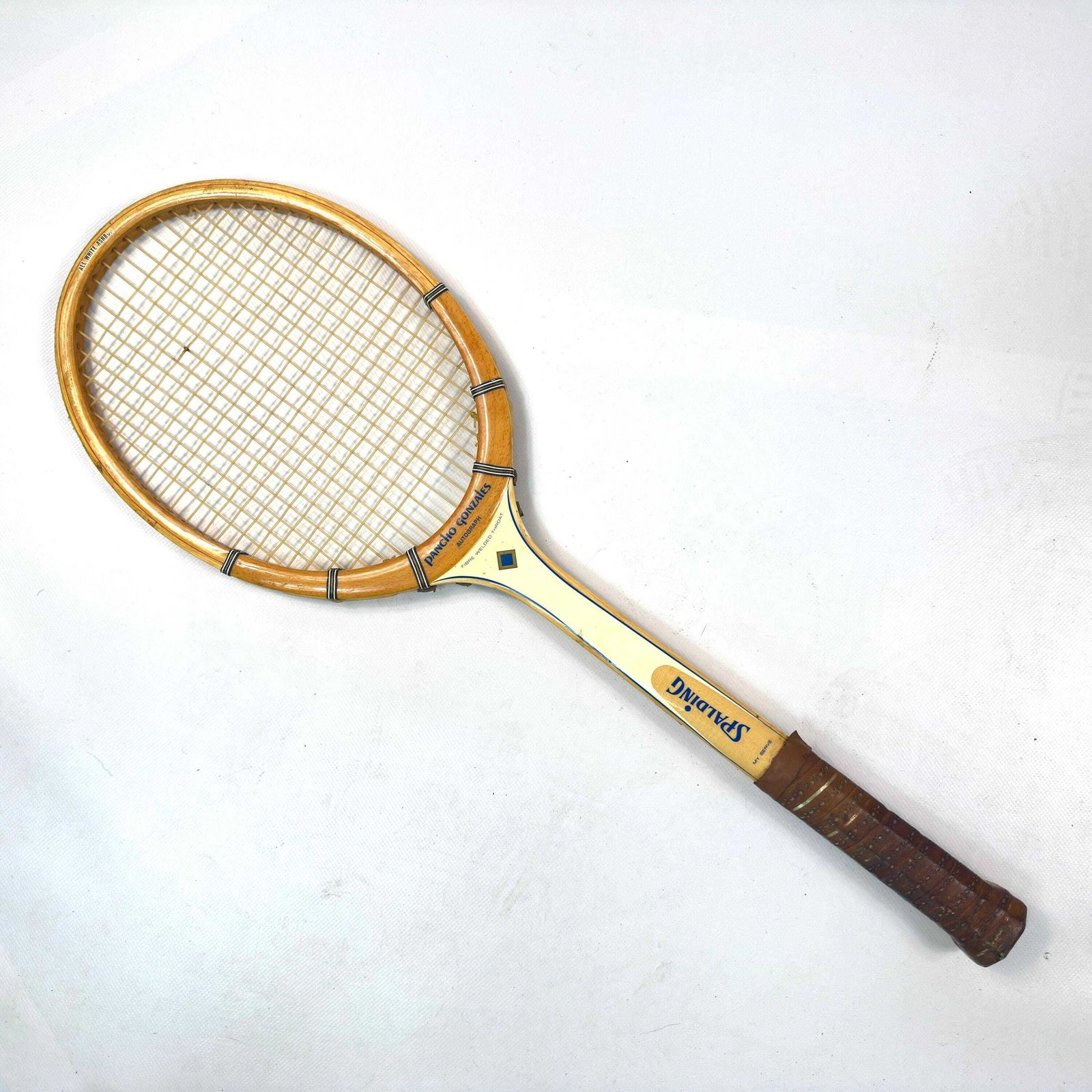 1960s Spalding Pancho Gonzales Tennis Racket With Press photo buy
