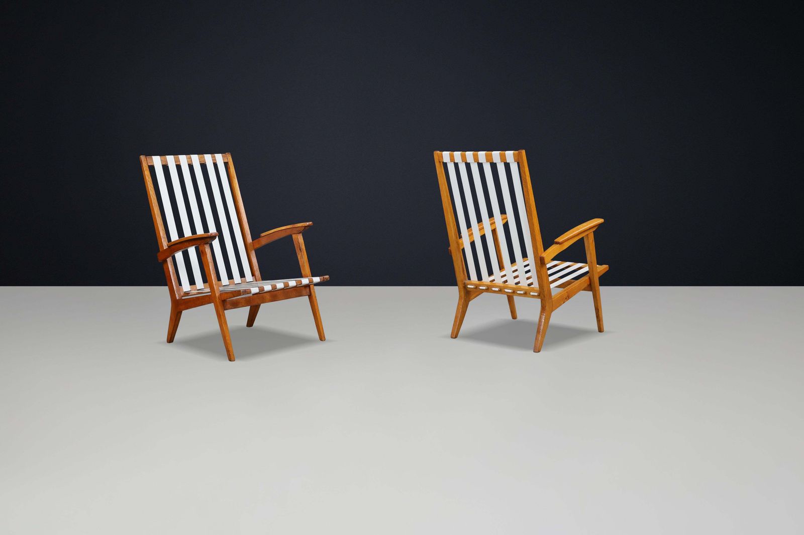 photo furniture Mid Century Modern Highback Armchairs In Oak And Canvas Straps, France, 1950s
