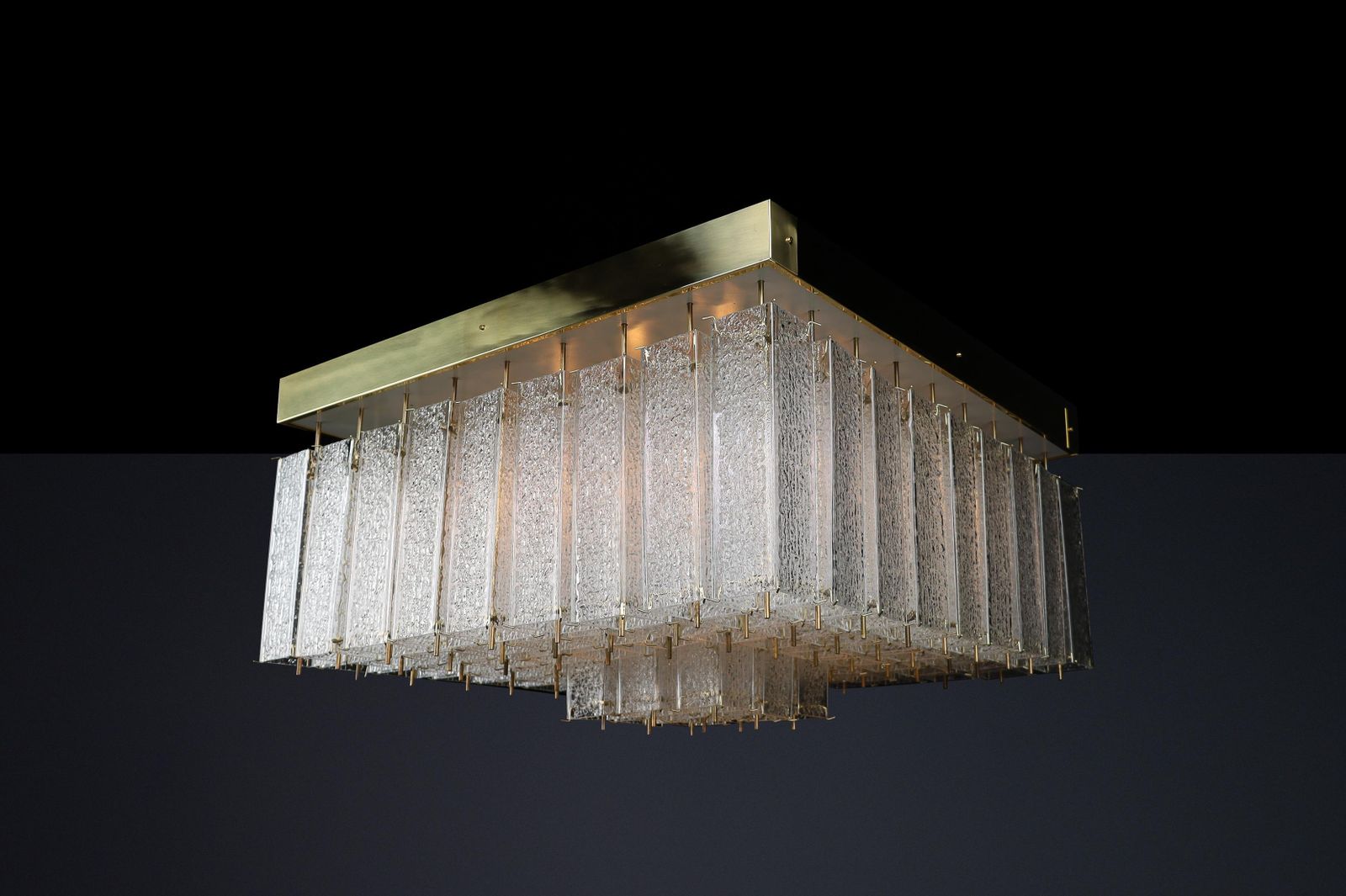 Monumental 1960s Bohemian Flush Mount Chandelier In Textured Glass And Brass. photo for sale