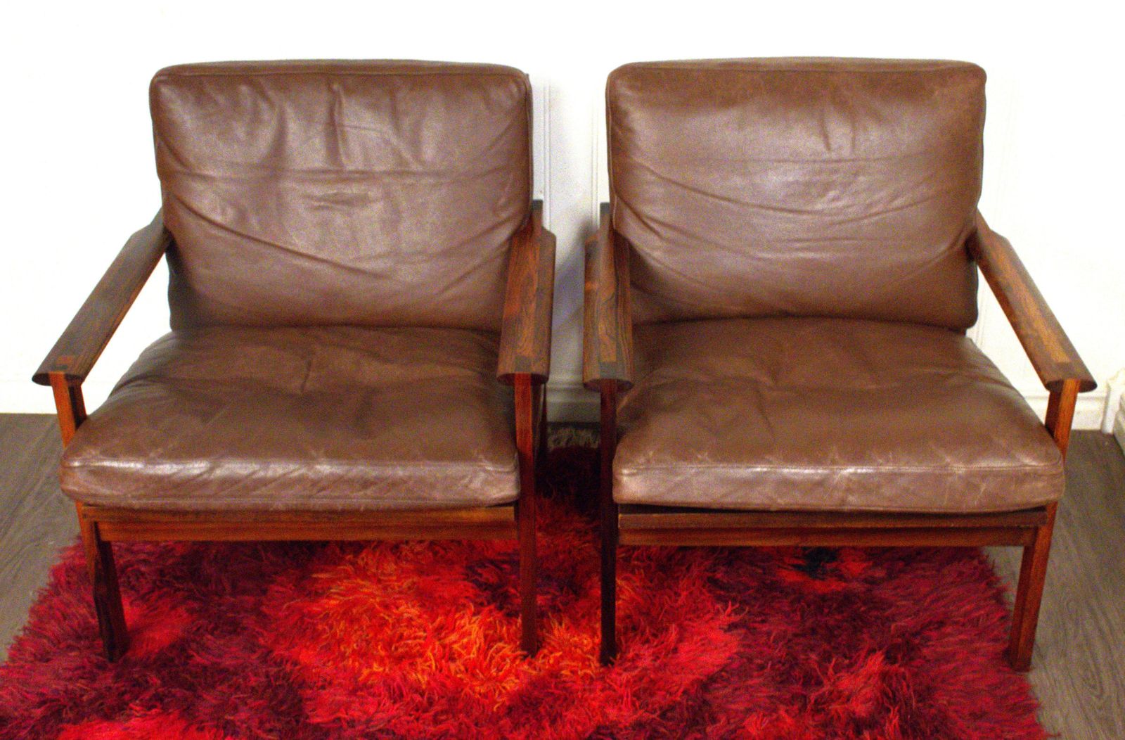 Furniture Danish Capella Lounge Chairs In Leather And Rosewood By Illum Wikkelsö For Eilersen Möbler, 1970s, Set Of 2 photo