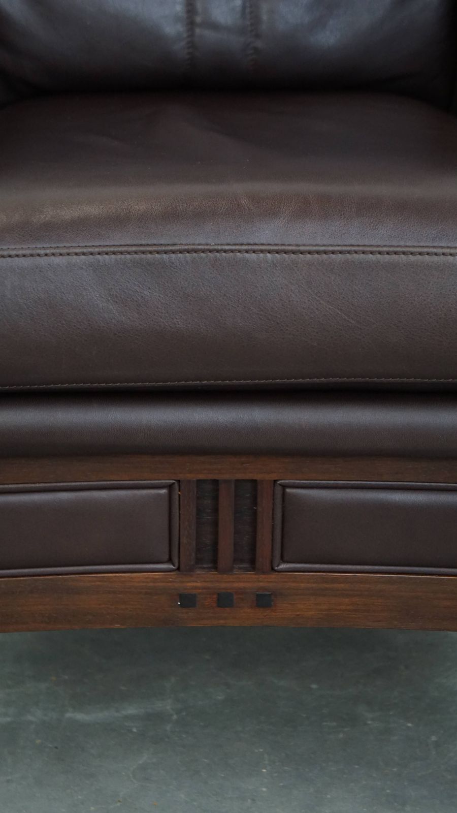 photo buy Luxurious Art Deco Design Armchair With Dark Brown Leather With Decorative Stitching