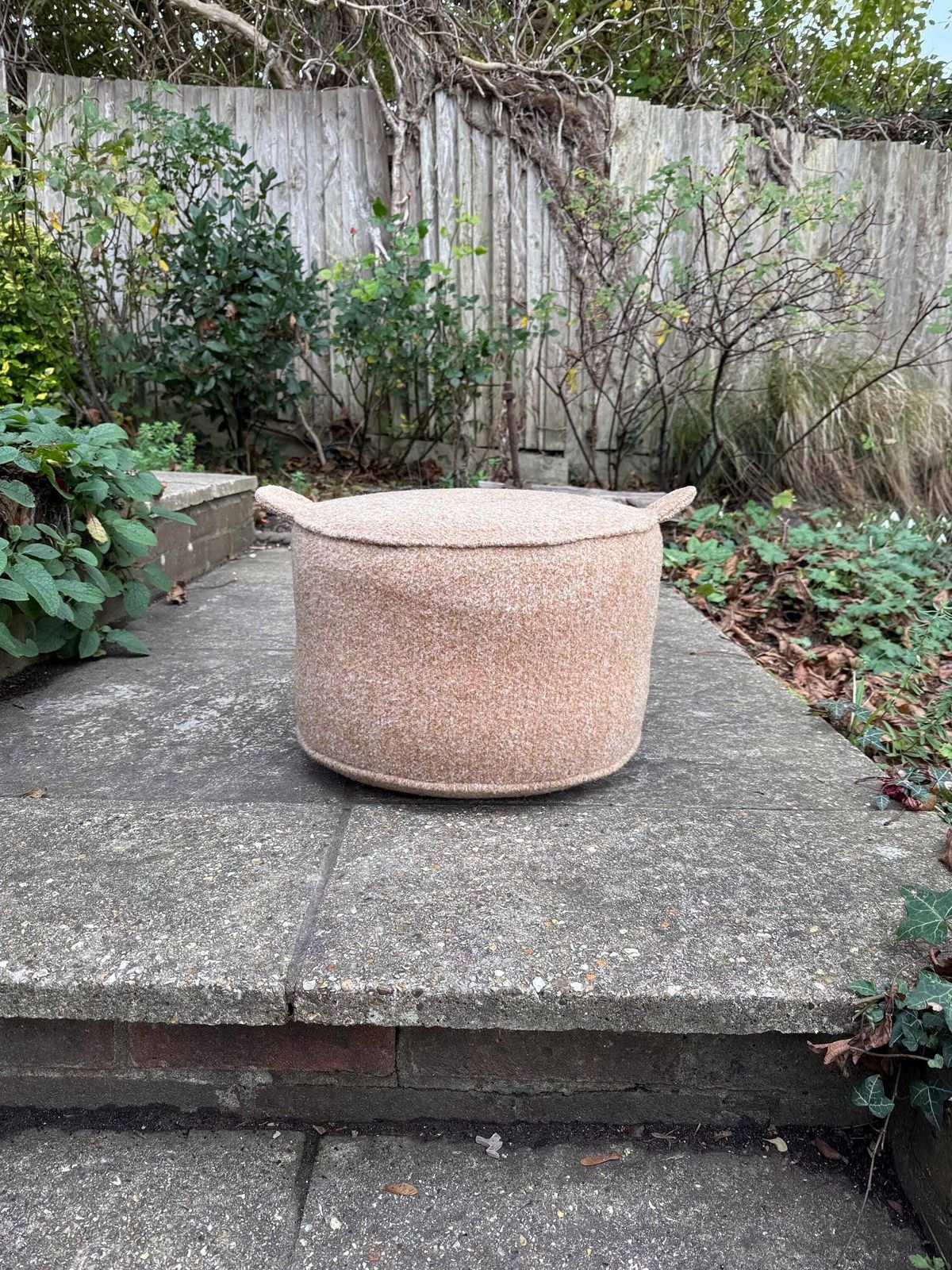 photo furniture Vintage Retro Wool Covered Pouf Footstool In Soft Camel Tan With Ear Like Handles