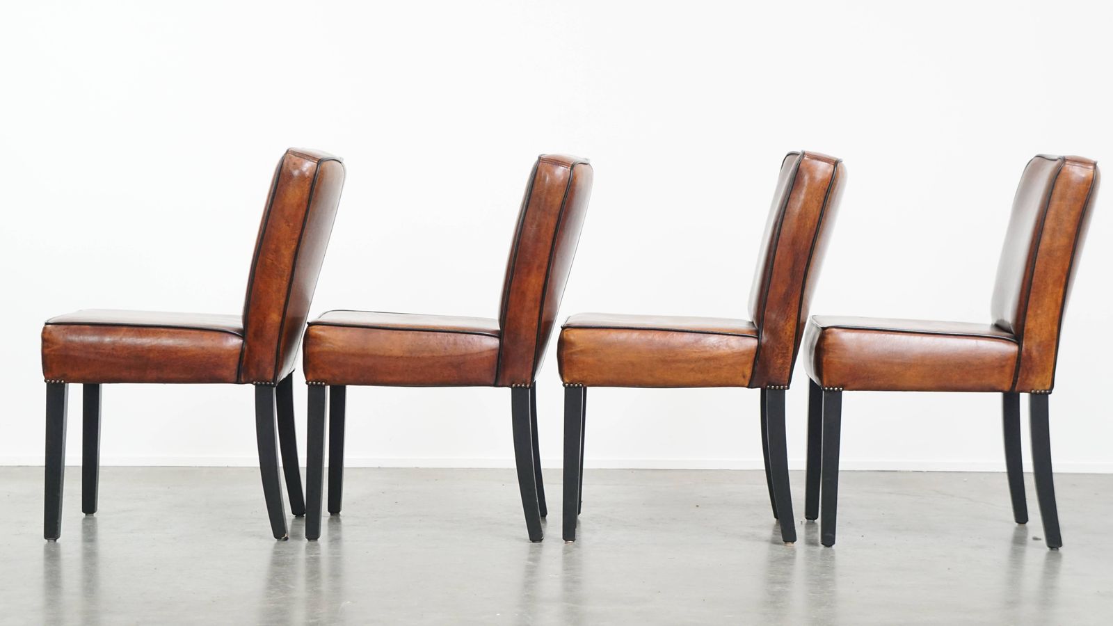 Luxurious Set Of 4 Comfortable Dining Chairs Made Of Sheepskin Finished With Black Piping photo 2119.0