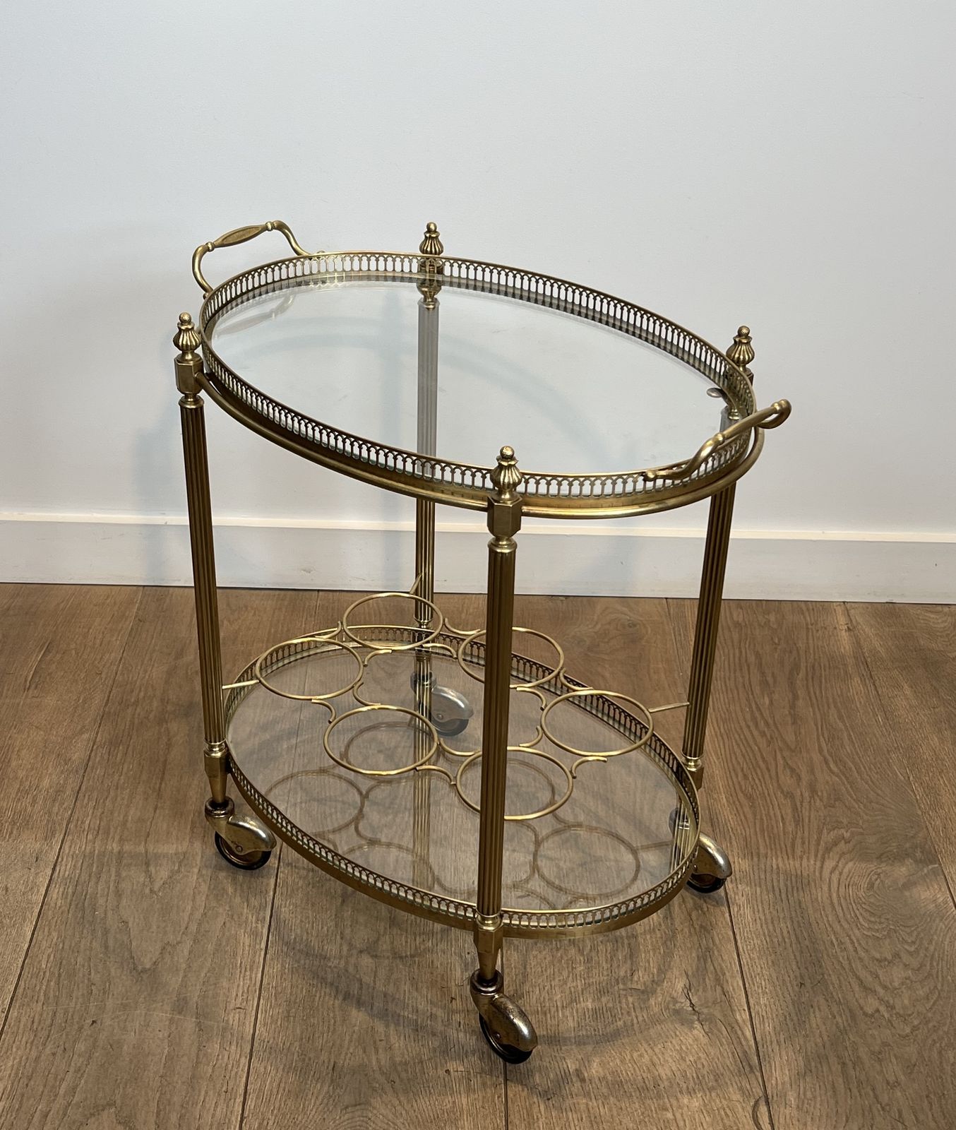 Oval Brass Rolling Table In The Style Of Maison Jansen. Circa 1940 photo for sale