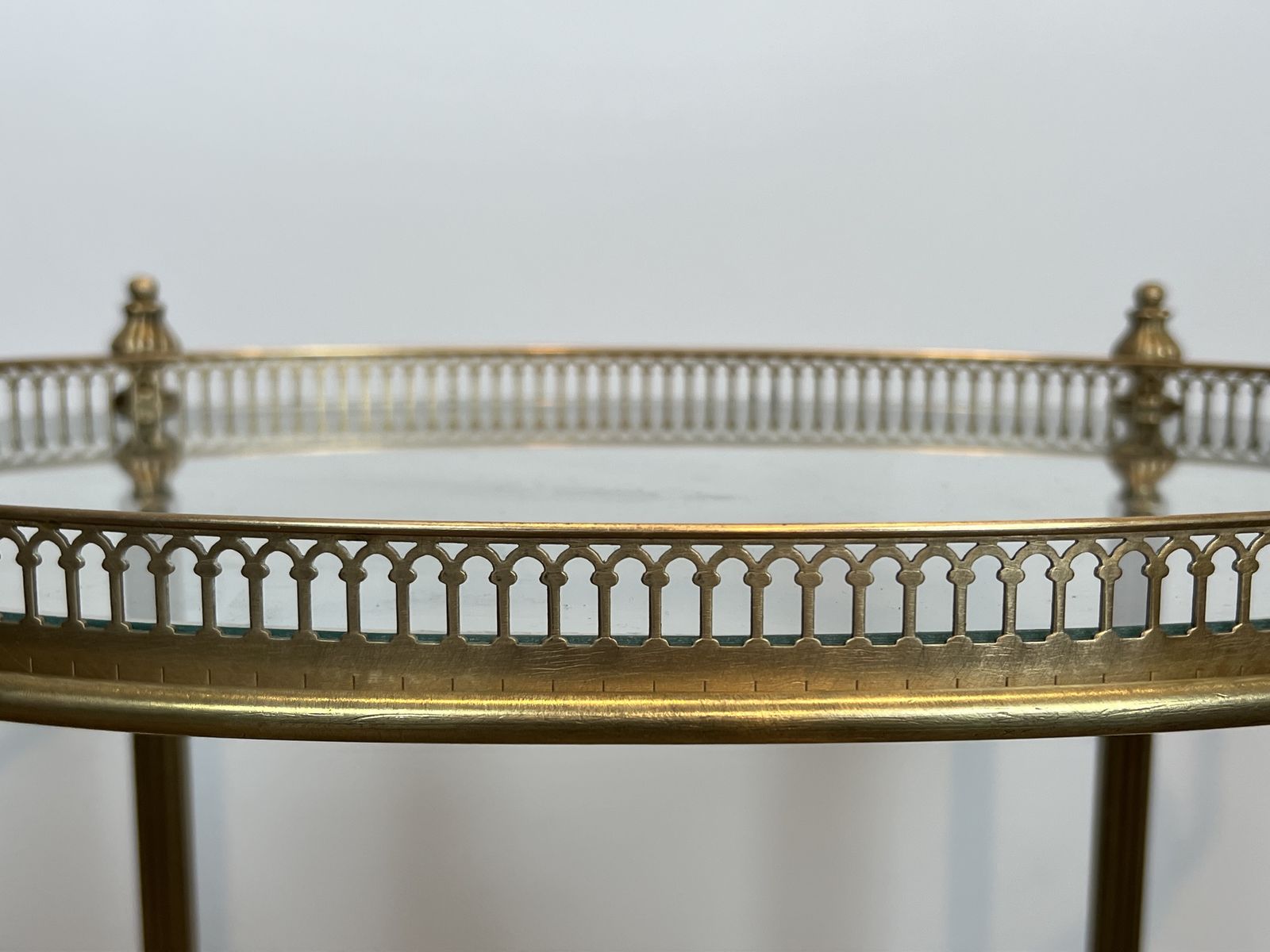 photo furniture Oval Brass Rolling Table In The Style Of Maison Jansen. Circa 1940