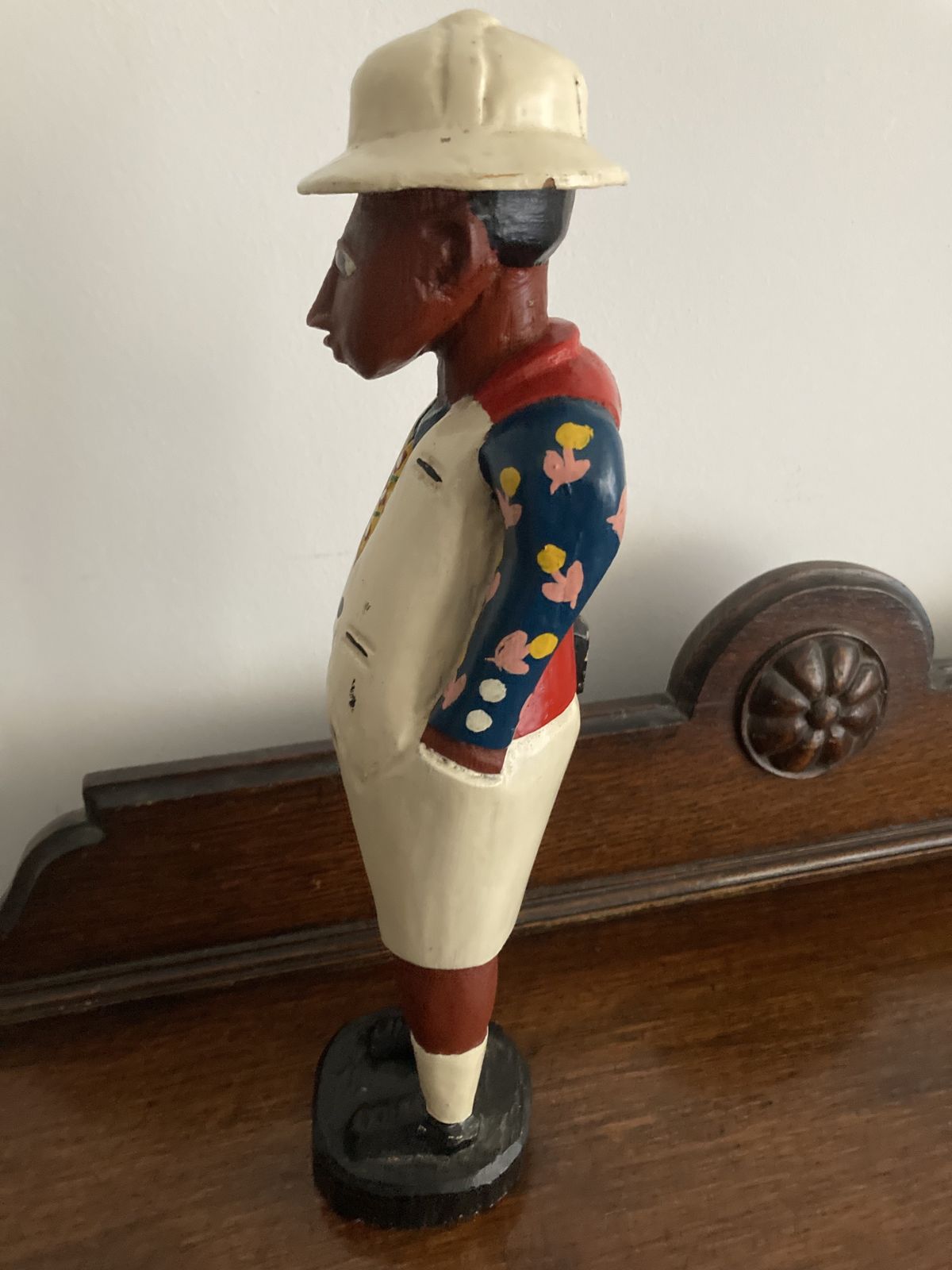 African "Colon Statue". Wooden photo for sale