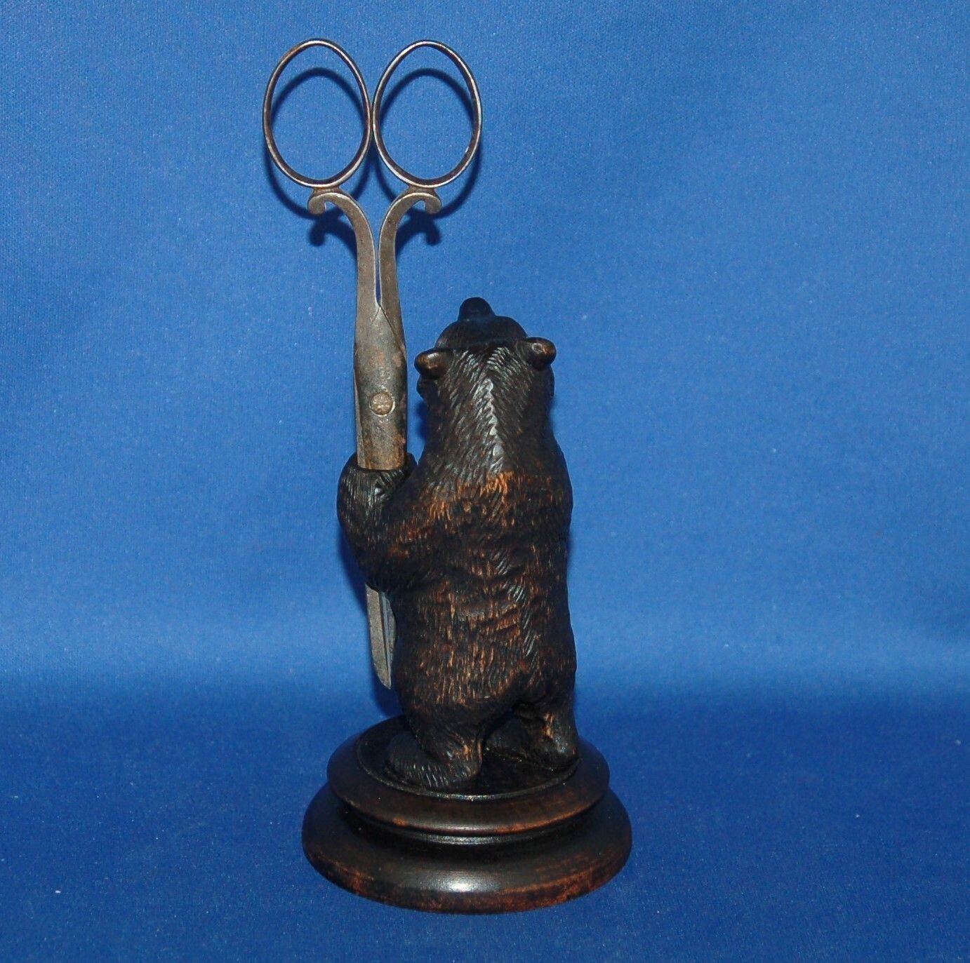 An Antique Carved Wooden Upright Standing Bear Figure Scissor Holder photo for sale