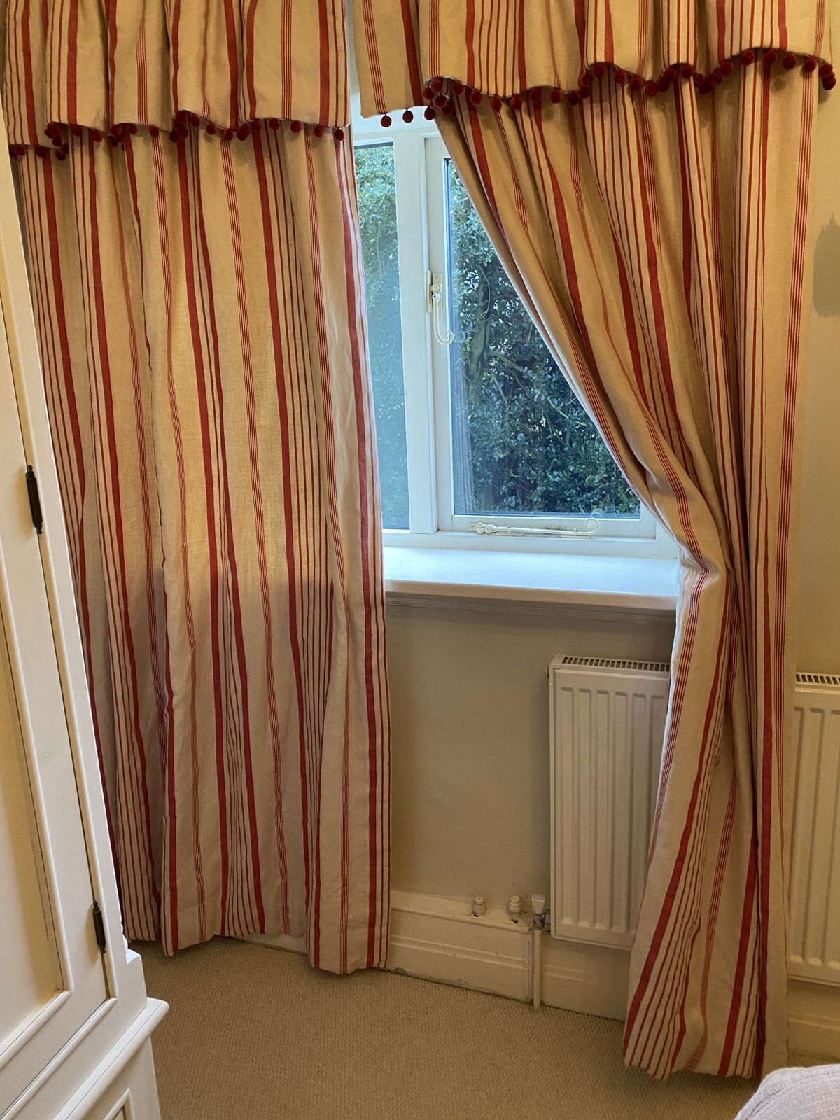 photo furniture Kate Forman Red Ticking Pocket Rod Curtains And D Shaped  Cream Metal Pole