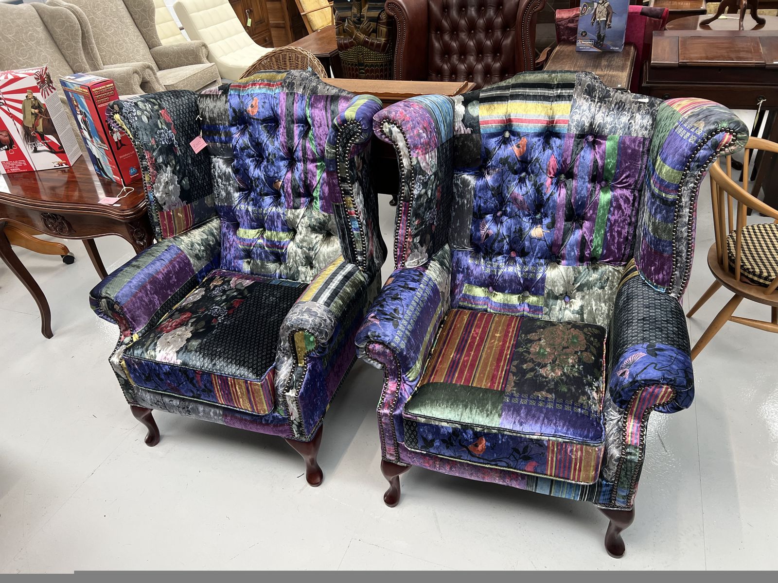 Pair Of Printed Fabric Wing Armchairs With Unusual Design