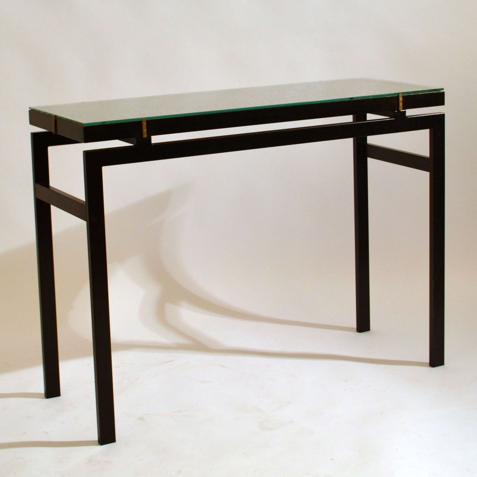 Console With Wood Relief Top And Glass On Black Metal Frame photo for sale