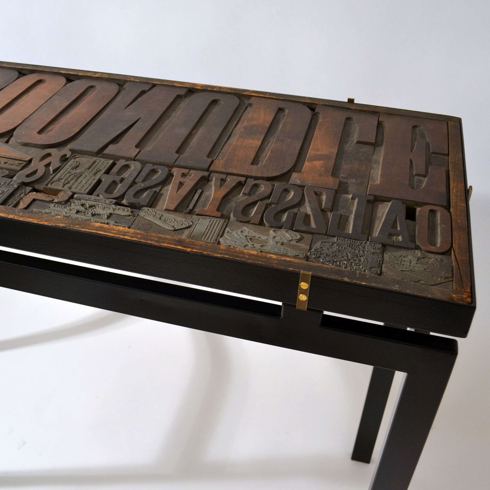 Console With Wood Relief Top And Glass On Black Metal Frame photo Furniture