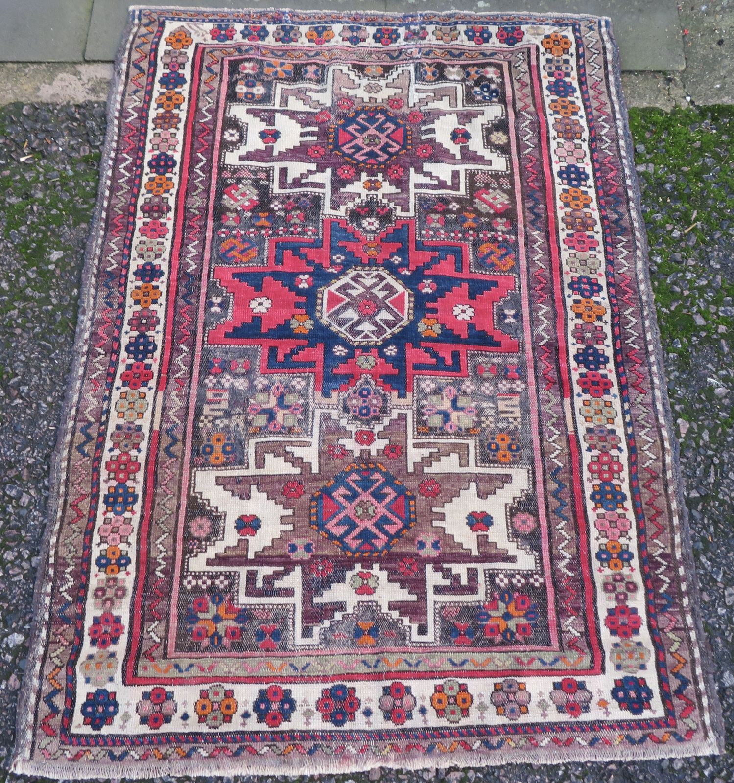 Distressed Caucasian Lesghi Rug. 140cm X 100cm.