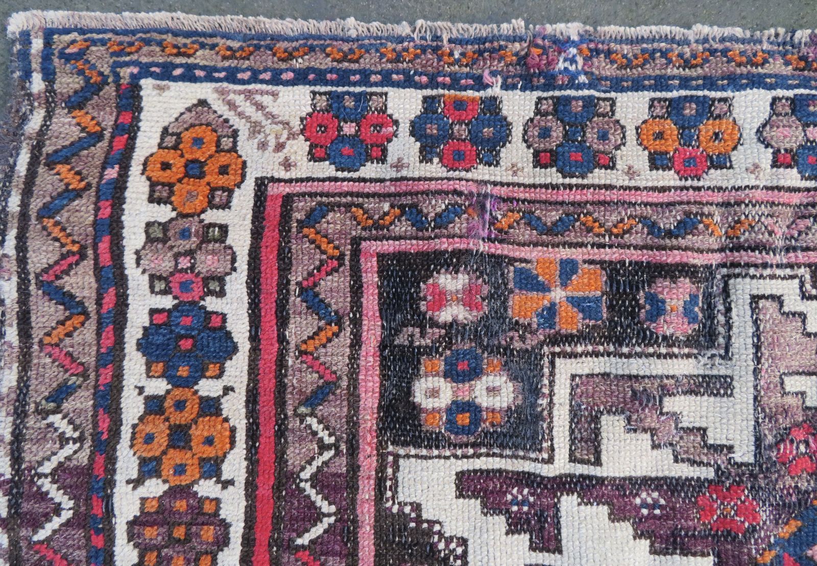 photo vinterior Distressed Caucasian Lesghi Rug. 140cm X 100cm.